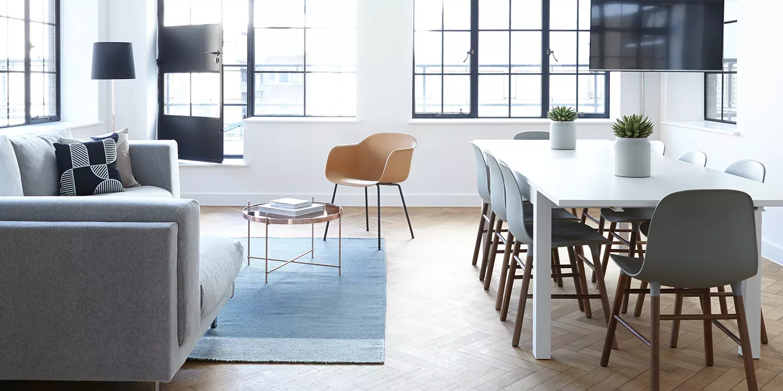 Home 13 Bright open-plan living and dining space with large industrial windows